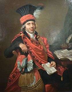 Portrait of a smiling man in ceremonial clothing