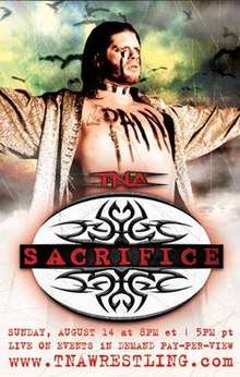 A poster with a white, black, and red logo with the word "Sacrifice" in red print across the center. A white adult male wearing a gold robe posing with the word "Pain" written across his chest while birds fly in the background is also featured.