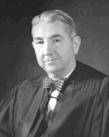 Black and white image of Tom C. Clark