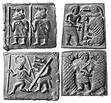 Black and white photograph of the four Torslunda plates. Counter-clockwise from bottom right, A, B, C and D (see text).