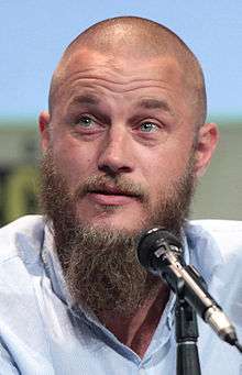 Fimmel at a microphone