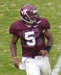 An American college football player wearing a maroon No. 5 uniform and helmet.