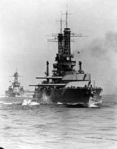 A black and white image of the Idaho in open water.