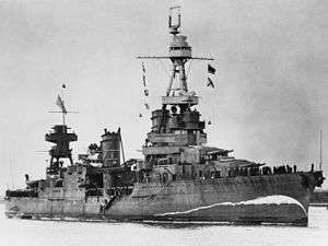 Second World War warship showing false bow wave