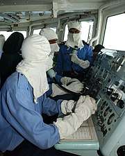Pakistan Navy's sailors wearing anti-flash gear while operating a Guided missile frigate,
