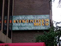 Photo of the National Debt Clock on September 24, 2004, at which time it read approximately 7.3 trillion USD in national debt