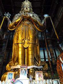 Tall statue of a bodhisattva
