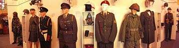 Uniforms on display in the museum.