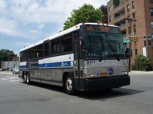 A Glen Oaks-bound QM5 bus at Union Turnpike and 164th Street.