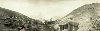 Panorama of the United Verde Smelter as it appeared in about 1909, replete with smoking smokestacks, many small buildings, and a curved section of railroad track