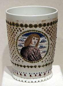 white cup with picture of man