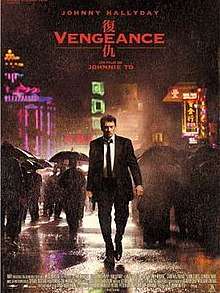 Several neon lights and buildings are seen in the background of a rainy setting. A man walks on a street, wielding a handgun in his right hand. Passersby are seen in the background behind the man, walking in different directions and holding umbrellas.  The top of the poster lists the Festival de Cannes logo, the film's lead actor, the title in both English and Chinese, and the film's director; the bottom right of the poster lists the production credits.
