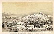 Drawing of small log buildings, with mountains in the background