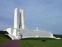 The Vimy memorial from the southeast. The memorial is very wide, indicative of being a photo from after the restoration.