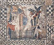 Top-down view of a square mosaic with a geometric border and a square inset showing Diana and her nymph surprised by Actaeon while bathing