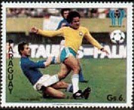Brazilian footballer being tackled from behind by an Italian player
