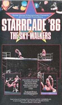 Official VHS cover featuring photos from Starrcade matches