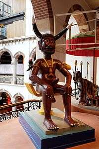 Sculpture of the loa Legba, who serves as the intermediary between the loa and humanity. Legba often appears as an old man, but in Benin, Nigeria and Togo, he is typically young and often horned and phallic.
