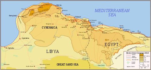 Topographic map of north east Libya (Cyrenaica) and north west Egypt. To the south lies the Great Sand Sea and the Qattara Depression; to the north, the Mediterranean Sea. The area in between is dominated by the high ground close the coast. The highest is the Jebel Akhdar in northern Cyrenaica between Benghazi in the east and Derna in the north, about 150 km away. Tobruk lies about another 150 km further east. Bardia lies another 110 km further east still, still in Cyrenaica but close to the border with Egypt. All are coastal towns. Roads and railways generally follow the coast, and there are only tracks in the interior.