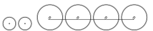 Diagram of two small leading wheels, and four large driving wheels joined by a coupling rod