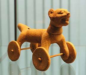 A toy animal with wheels