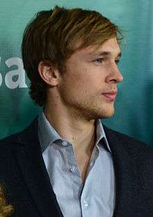 William Moseley looking away from the camera.