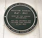 The plaque reads: "William Terriss: 1847–1897. Hero of the Adelphi Melodramas. Met his untimely end outside this theatre 16 Dec 1897.