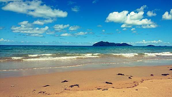 Wongaling Beach with Dunk Island in view.