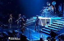 X Japan performing at Madison Square Garden in 2014. From left-to-right, Pata, Heath, Sugizo, Toshi, Yoshiki.