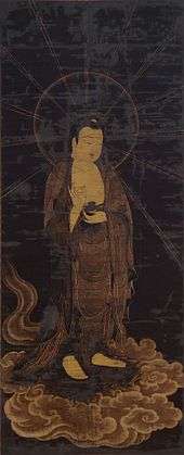 Color painting of a representation of a Buddha, standing on a cloud, on a black background.