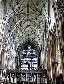 This interior view at York shows the Gothic style becoming less about projecting forms and more about surface treatment. The walls, vault and east window are all covered with a decorative net-like tracery. The pattern of the vault ribs resembles interconnecting stars.