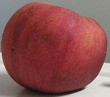 A 'York Imperial' apple, red with green streaks