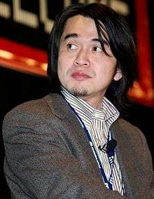 A picture of Yoshiaki Koizumi, the game's director and designer.