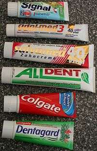 A photo of 6 tubes of toothpaste where each tube is a unique brand