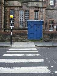 Crosswalk with simple white parallel lines in Edinburgh