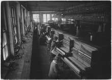Row of key fitters at the Cable Company St. Charles Il. factory.