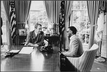 Color photo of Nixon and Ray Charles