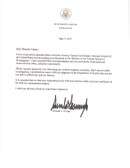 A brief letter on an 8.5×11 sheet of White House stationery with a colored seal at the top and large signature in marker