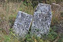 Two tombstones askew