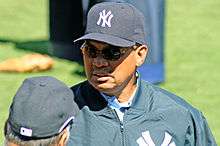 Reggie Jackson, wearing a New York Yankees baseball cap